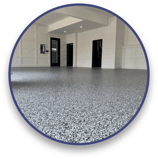 Bright residential garage with a grey flake floor coating